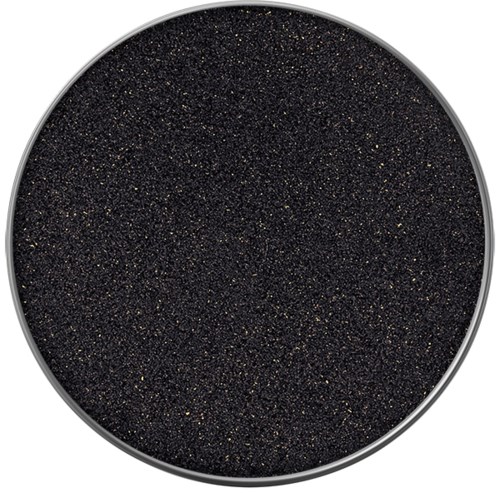 En rund svart yta med små glänsande prickar som liknar en stjärnhimmel eller glitter.