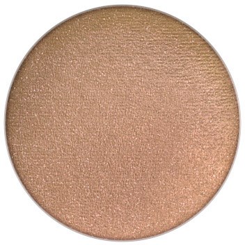 En rund, beige ögonskugga med skimrande, metallisk finish, passande för smink.