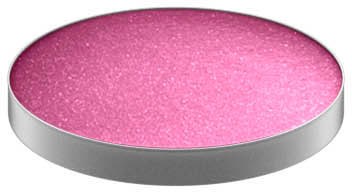 Ett rosa, glitterigt runt objekt med en silverkant, möjligen ett kosmetiskt eller dekorativt föremål.