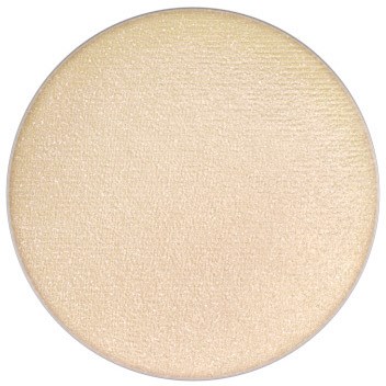 Ympyrämäinen, beige, hohtava meikkituote, todennäköisesti irtopuuteri tai korostusväri.