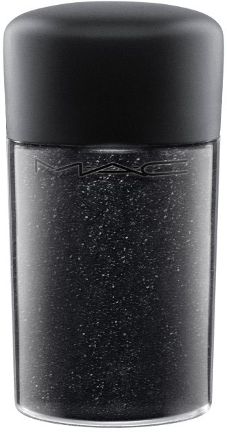 A small black bottle with a grey cap, filled with sparkly black liquid, labeled with MAC.