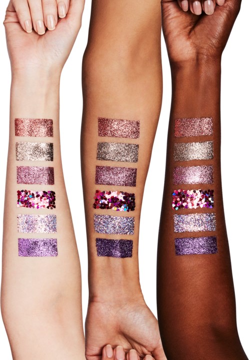 Three arms with different skin tones display rows of colorful, glittery makeup swatches or stickers. Each arm has six stripes.