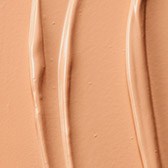 Een beige foundation met een gladde textuur, met drie verhoogde, gebogen lijnen voor het ontwerp.