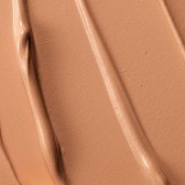 EenClose-up van vloeibare chocolade met gladde, gebogen lijnen en een glanzend oppervlak.
