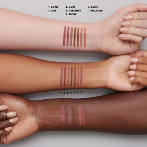Three arms show different shades of makeup swatches labeled with names and numbers.