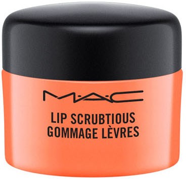 En liten rund orange burk med svart lock, märkt 'MAC Lip Scrubtious' för läppar.