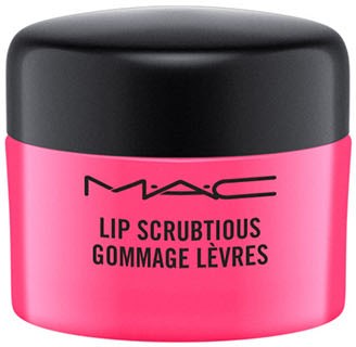 Ett rosa burk med svart lock märkt 'MAC Lip Scrubtious Gommage Lèvres'.
