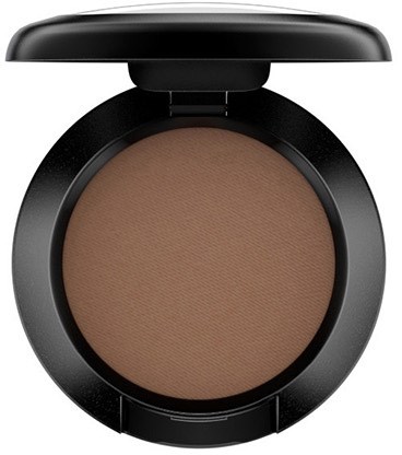 A compact with brown pressed powder and a black lid, used for makeup.