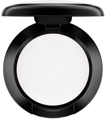 A round white powder inside a black compact case with a lid. It looks like face powder or foundation makeup.