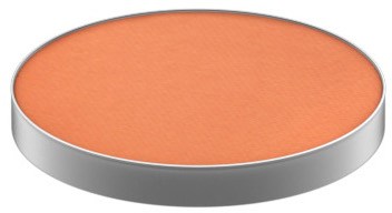 En rund, orange makeup blush med sølvkant.