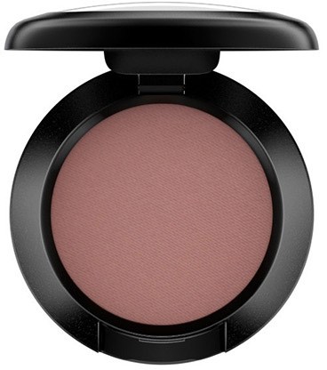 Ein kompaktes Make-up-Produkt mit geschlossenem schwarzen Deckel, mit rosa Puder.