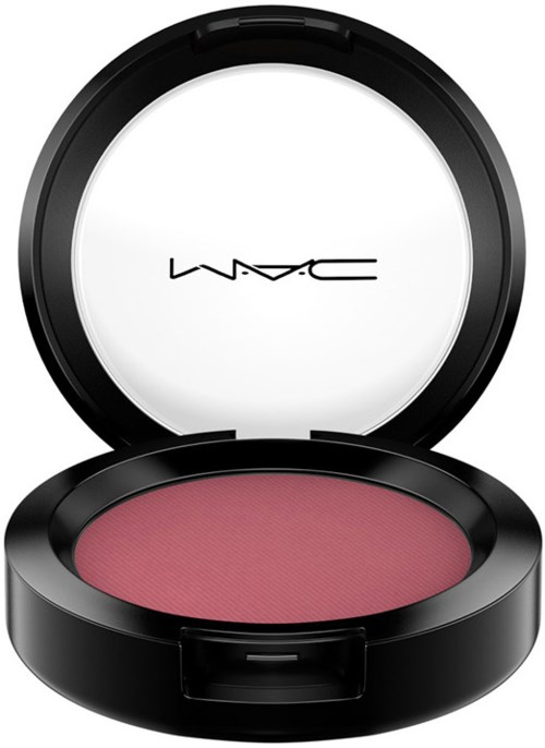 Ett runt sminkkompact med rosa rouge och ett MAC-logotyp på insidan av locket.