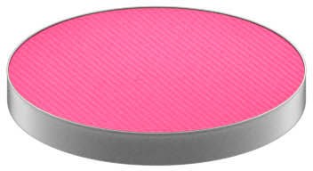 A pink circular object with a ribbed texture on top and a silver edge.