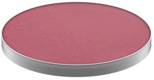 A round makeup blush or compact with a pink surface and silver edge.