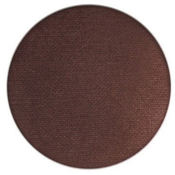 A round, dark brown textured surface, possibly fabric or wood. No key elements or objects are visible.