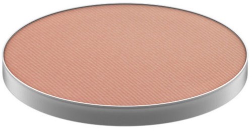 A round makeup powder compact with a peach-colored powder inside.