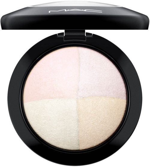 A round makeup compact with four different shades of powder inside, branded MAC on the lid.