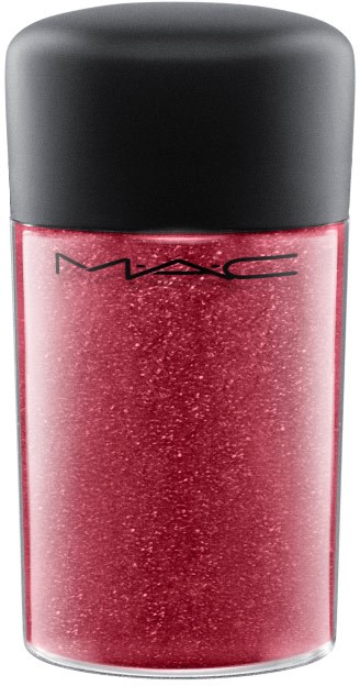 A small jar of red glittery M·A·C makeup product with a black cap.