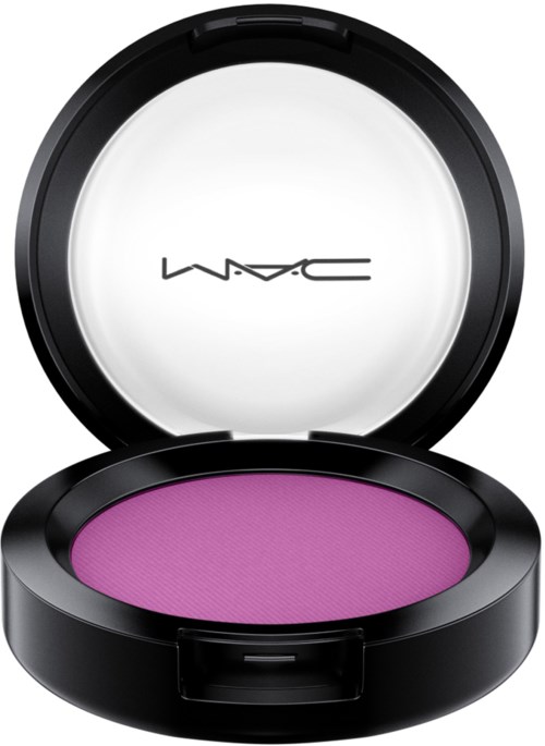 A round makeup compact with purple eyeshadow inside and MAC logo on the lid.