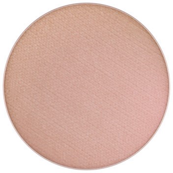En rund blush-makeupprodukt i myk rosa nyanse.