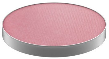 En rund rosa föremål med en metallisk silverkant, platt på toppen, enkel design.