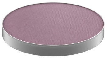 En rund, lila, texturerad yta med en silverkant, verkar vara ett lock eller lock.