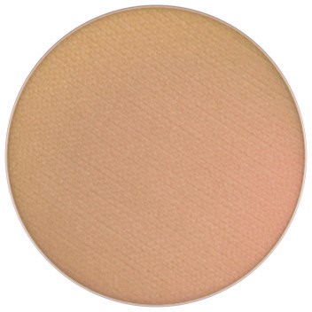 En rund puderögonskugga med beige puder inuti. Ingen text eller dekoration syns.