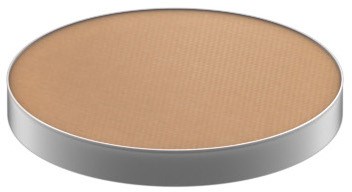 En rund, beige färgad sak med en silverkant. Den ser platt och slät ut.