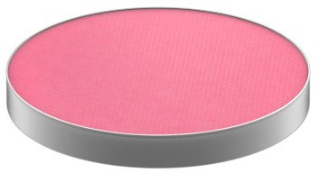 En rund rosa overflate med sølvkant, ser glatt og flat ut.