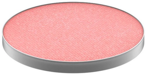 En rund, rosa makeup-rouge eller ansiktspuderbehållare med en silverkant.