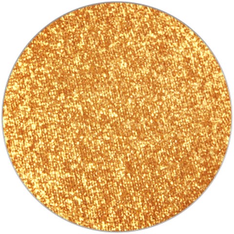 En stor rund overflade dækket af skinnende guldglitter, funklende og skinnende.