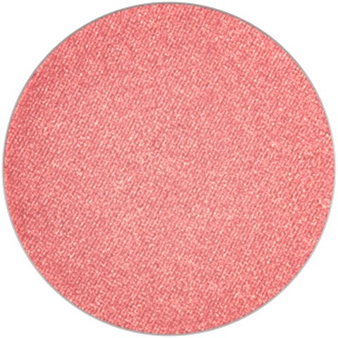 En rund, pink, tekstureret kosmetik blush eller øjenskygge uden synligt mærke eller etiket.