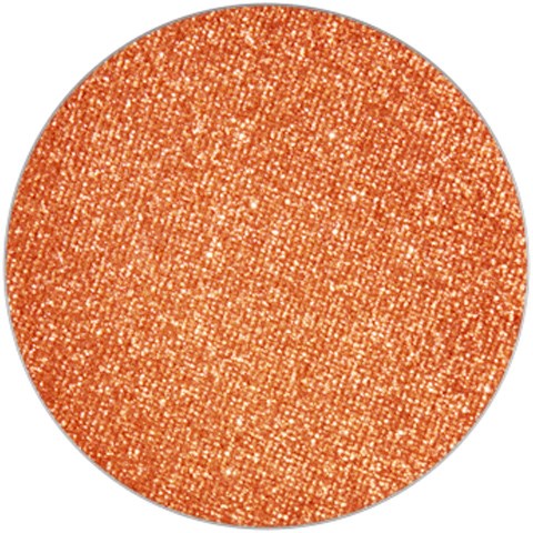 Ett runt föremål täckt av många små, glittrande orange prickar. Det ser glittrande och ljust ut.