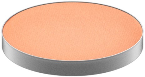 En rund, flad ting med orange top og sølv sider.