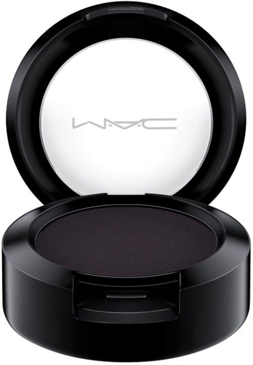 Ein runder schwarzer Make-up-Deckel mit Spiegel innen, enthaltenes dunkles Makeup-Produkt.