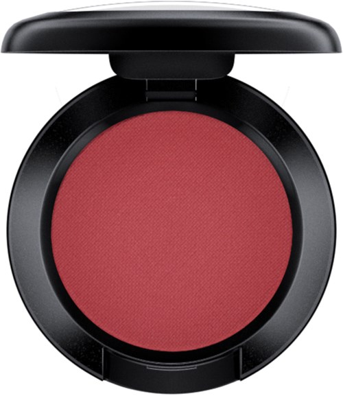 Ein runder roter Blush-Compact mit schwarzem Gehäuse und offenem Deckel.