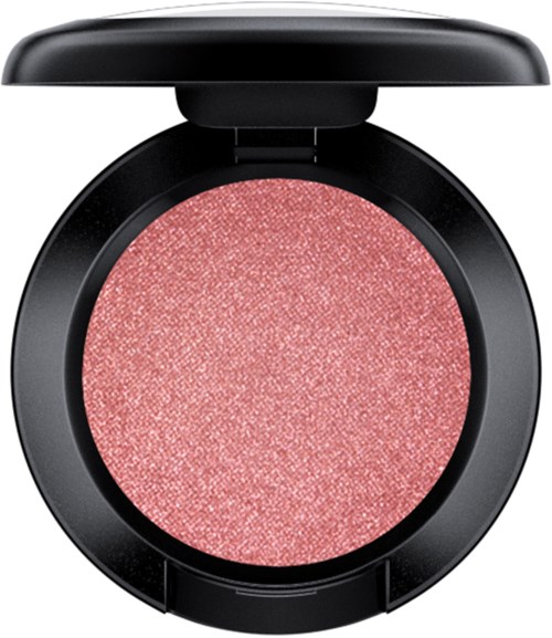 En rund makeup blush med rosa, glitrende overflate i en svart beholder.