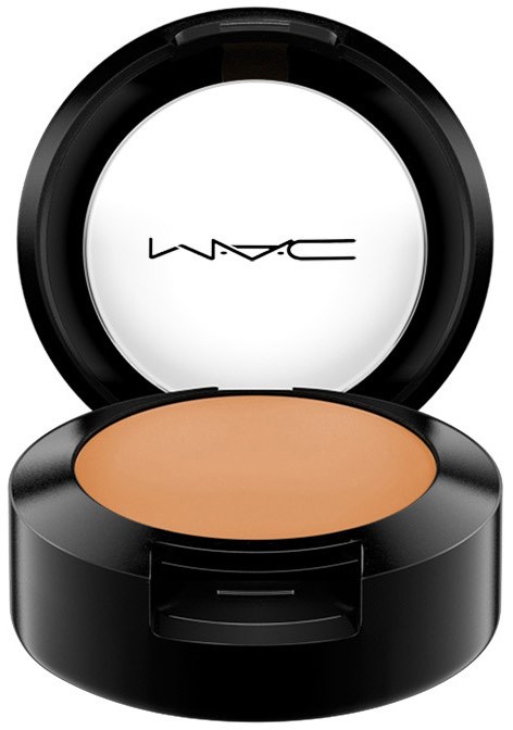 Ein runder Make-up-Deckel mit Spiegel, enthält beige Puder, und das MAC-Logo auf dem Spiegel.