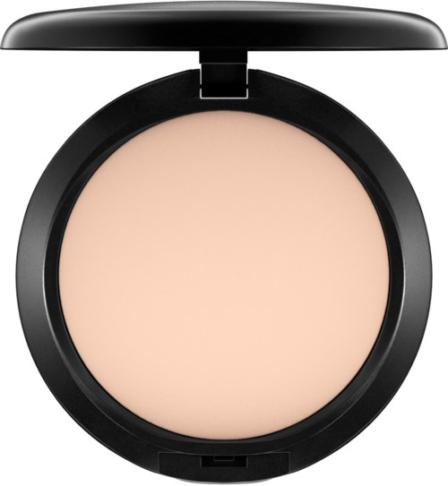 A compact with light beige face powder and a black lid.