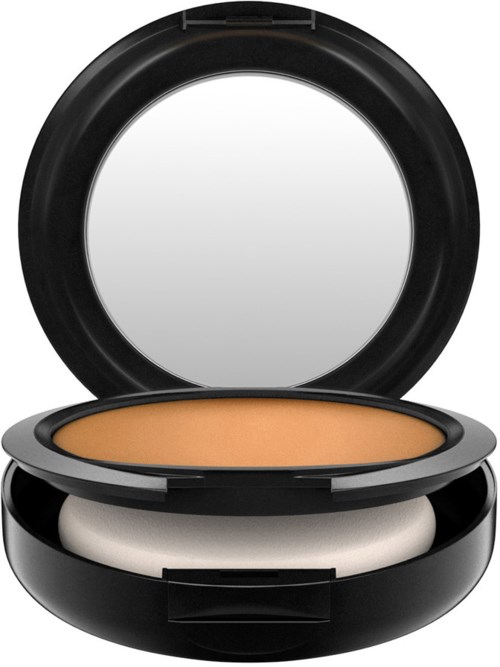Ein kompakter Make-up-Grundton mit Spiegel im Deckel und beige Puder.