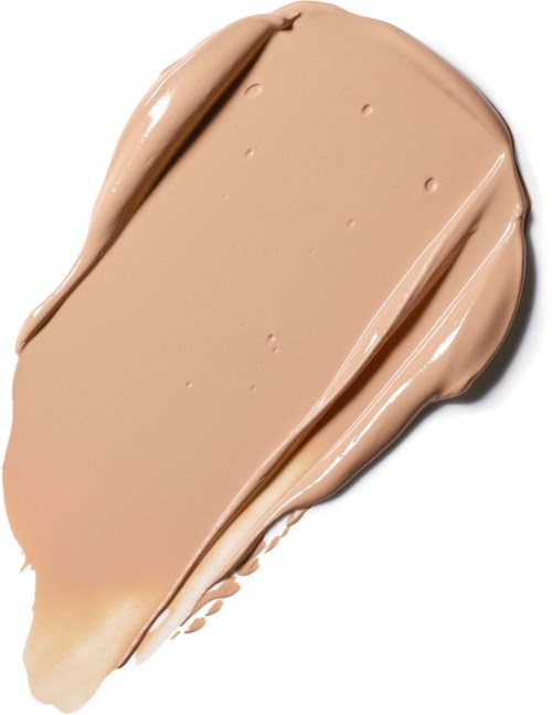 En beige foundation eller creme spredt med to linjer på toppen, nogle områder er lidt tykkere.