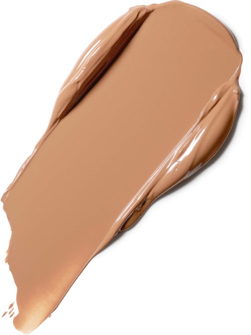 En farveprøve af beige-farvet flydende makeup, spredt på en hvid baggrund. Ser glat og cremet ud.