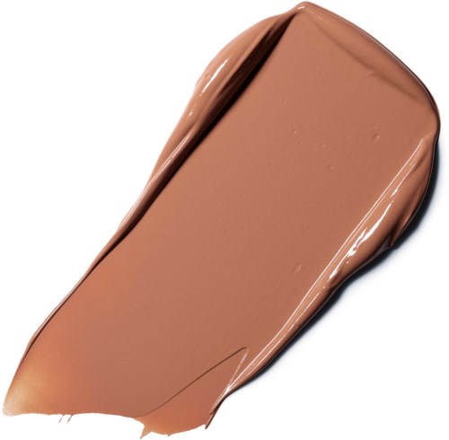 En chokoladebar med glat, blank overflade og afrundede kanter.
