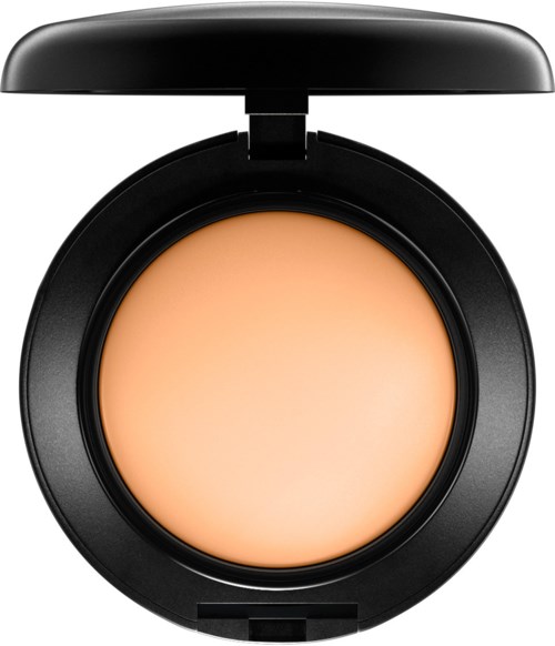 Eine runde Make-up-Box mit beiger Creme, offen, einfache schwarze Hülle.