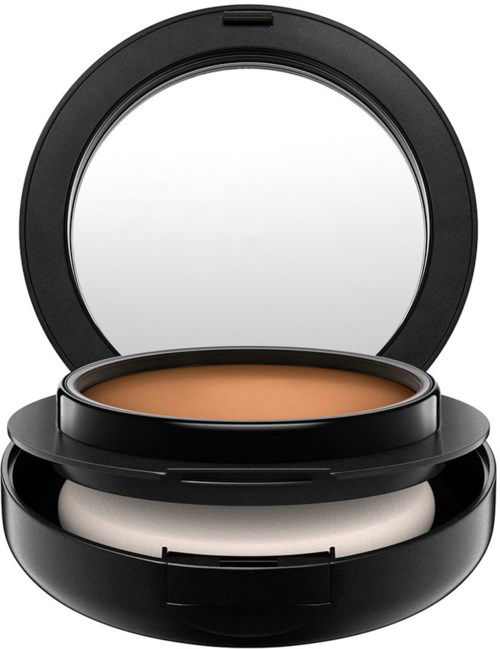 Ein kleines Make-up-Puder-Case mit Spiegel und beiger Puder.