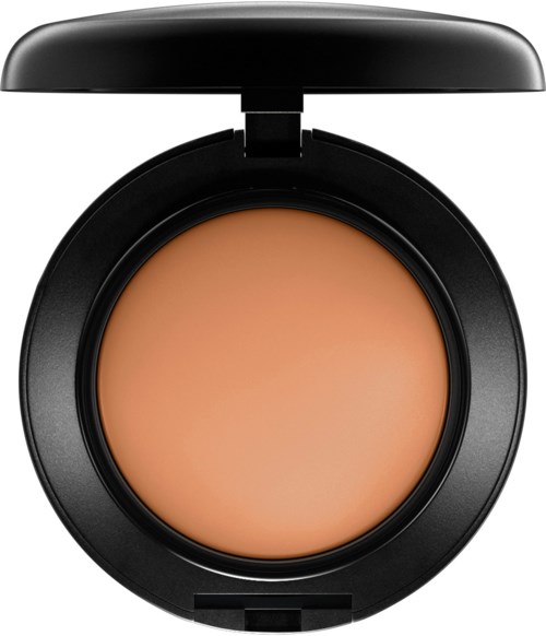 Ein kompakter, runder Make-up-Container mit Foundation darin und einem Deckel oben.
