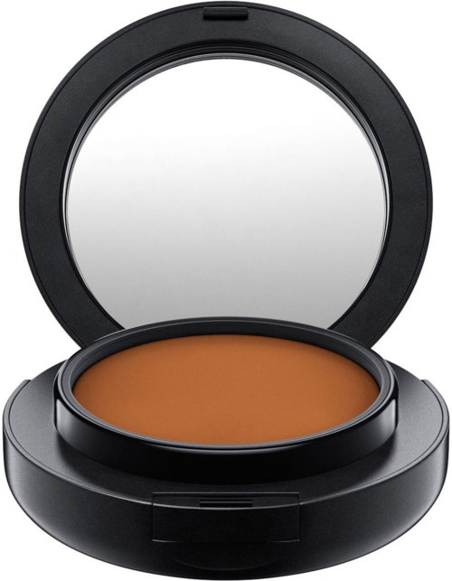 Ein runder Kompakt mit Spiegel und beigefarbenem Puder, wahrscheinlich für Make-up.