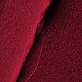 Rote strukturierte Oberfläche mit einem deutlichen Riss in der Mitte.