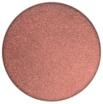 Een ronde oogschaduw met een glinsterende, perzik-roze kleur en sprankelende afwerking.