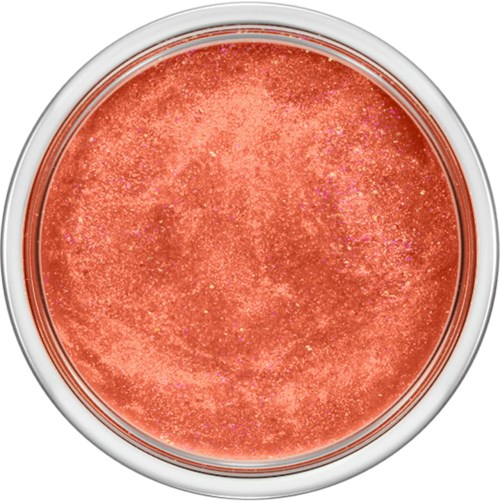 En glänsande, glittrande orange blush eller ögonskugga i en rund behållare.